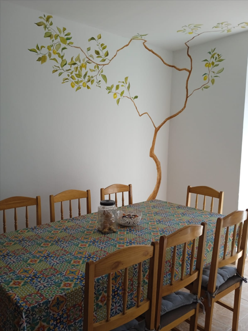 Dining room with lemon tree mural